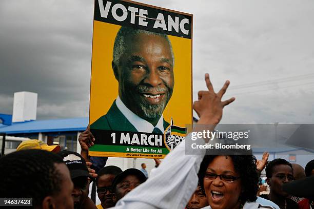 Supporters of the South African President Thabo Mbeki make a hand sign meaning "third term" ahead of the ANC conference in Polokwane, Limpopo...