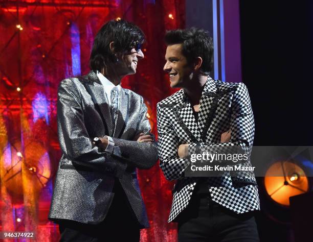 Inductee Ric Ocasek of The Cars and musician Brandon Flowers speak onstage 33rd Annual Rock & Roll Hall of Fame Induction Ceremony at Public...