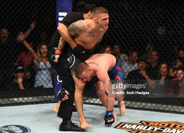 Dustin Poirier defeats Justin Gaethje in their lightweight fight during the UFC Fight Night event at the Gila Rivera Arena on April 14, 2018 in...