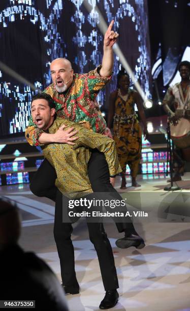 Italian beauty tutor Giovanni Ciacci and his dance partner Raimondo Todaro perform on the Italian TV show 'Ballando Con Le Stelle' at RAI Auditorium...