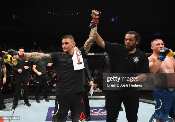 Dustin Poirier celebrates his victory over Justin Gaethje in their lightweight fight during the UFC Fight Night event at the Gila Rivera Arena on...