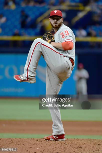 Drew Hutchison of the Philadelphia Phillies winds up a pitch during the bottom of the ninth inning in a 9-4 win over the Tampa Bay Rays on April 14,...