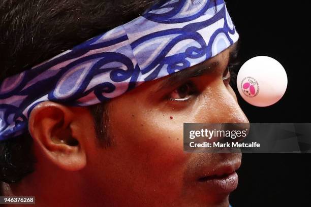 Sharath Achanta of India serves in the Men's Singles Bronze Medal Match against Samuel Walker of England during Table Tennis on day 11 of the Gold...