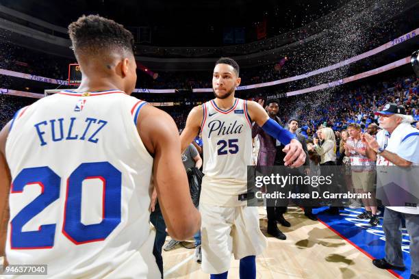 Markelle Fultz and Ben Simmons of the Philadelphia 76ers exchange a hug after game one of round one of the 2018 NBA Playoffs against the Miami Heat...