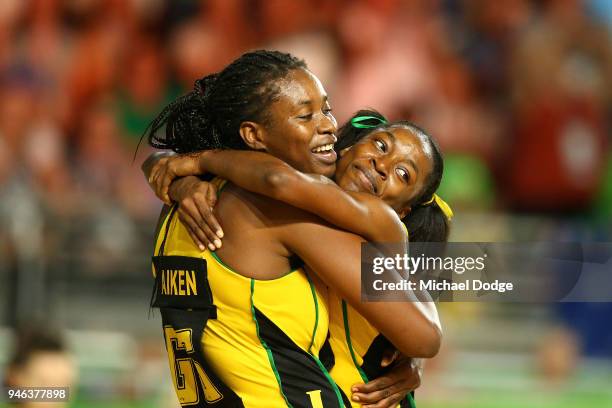 Romelda Aiken and Shanice Beckford of Jamaica celebrate victory in the Netball Bronze Medal Match on day 11 of the Gold Coast 2018 Commonwealth Games...