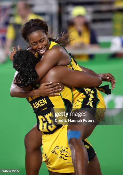 Romelda Aiken and Stacian Facey of Jamaica celebrate victory in the Netball Bronze Medal Match on day 11 of the Gold Coast 2018 Commonwealth Games at...