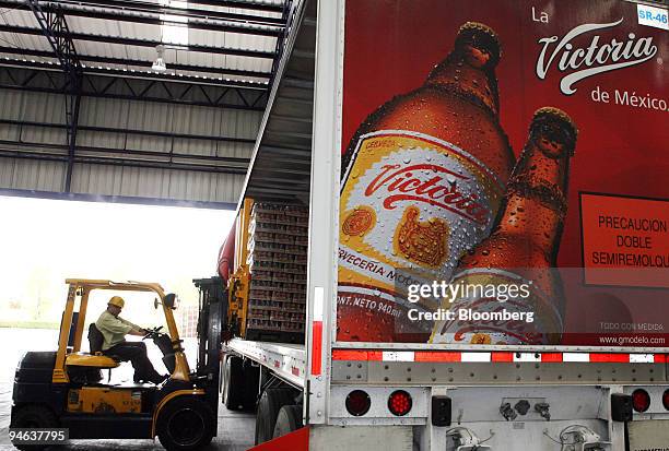 Beer is loaded onto a trailer at the Grupo Modelo SAB beer factory in the state of Zacatecas, Mexico, on Aug. 22, 2007.