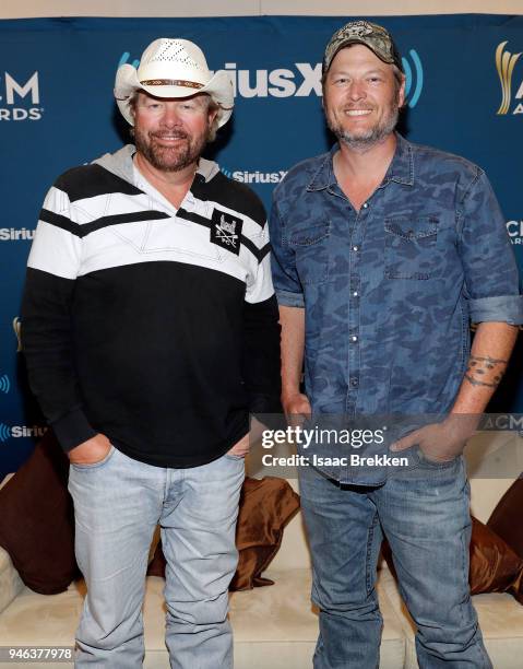 Toby Keith and Blake Shelton attend SiriusXM's The Highway channel broadcast backstage at the Academy of Country Music Awards on April 14, 2018 in...