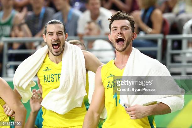 Australia guard/forward Chris Goulding and Australia forward Angus Brandt celebrate during the Men's Gold Medal Basketball Game between Australia and...