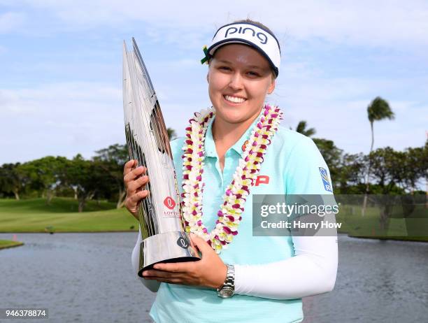 Brooke Henderson of Canada poses with the trophy after a four shot victory in the LPGA LOTTE Championship at the Ko Olina Golf Club on April 14, 2018...