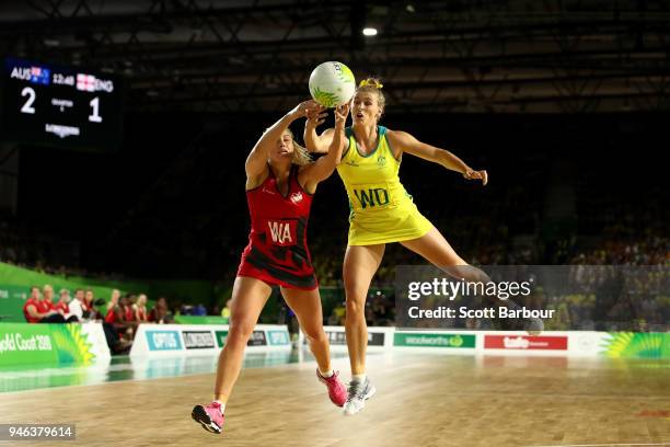 Gabi Simpson of Australia and Chelsea Pitman of England compete for the ball during the Netball Gold Medal Match on day 11 of the Gold Coast 2018...