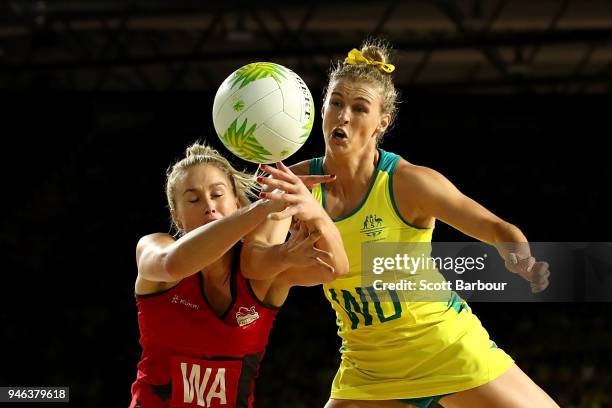 Gabi Simpson of Australia and Chelsea Pitman of England compete for the ball during the Netball Gold Medal Match on day 11 of the Gold Coast 2018...