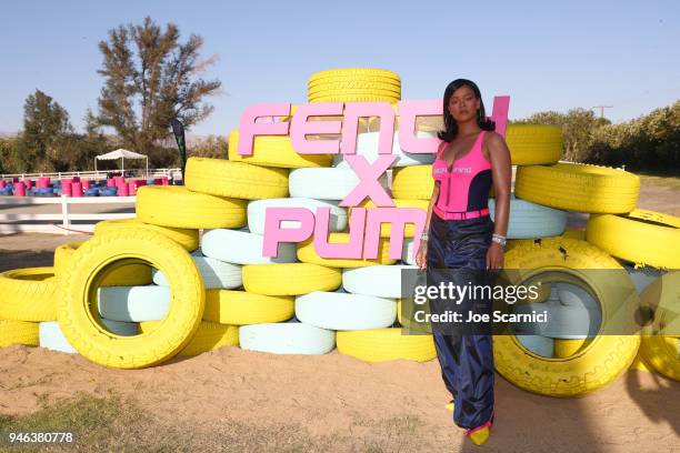 Rihanna attends the FentyXPUMA Drippin event launching the Summer '18 collection at Coachella on April 14, 2018 in Thermal, California.