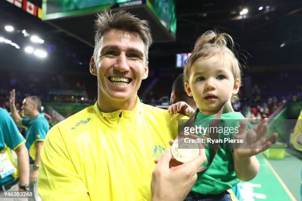 Australia guard Damian Martin celebrates winning gold during the medal ceremony for the Men's Gold Medal Basketball Game between Australia and Canada...