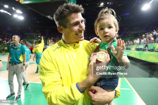 Australia guard Damian Martin celebrates winning gold during the medal ceremony for the Men's Gold Medal Basketball Game between Australia and Canada...