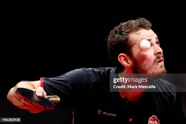 Samuel Walker of England serves against Sharath Achanta of India in their Men's Singles Bronze Medal Match during Table Tennis on day 11 of the Gold...