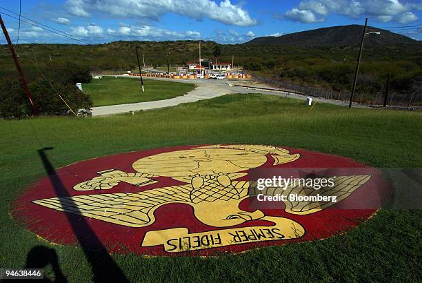 The U.S. Marine Corps logo faces toward Cuba at the only land border crossing at the U.S. Naval Station in Guantanamo Bay Cuba, Wednesday, December...