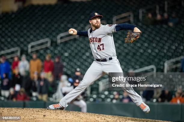 Chris Devenski of the Houston Astros pitches against the Minnesota Twins on April 9, 2018 at Target Field in Minneapolis, Minnesota. The Astros...