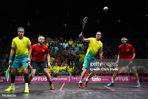 Adrian Waller and Daryl Selby of England and David Palmer and Zac Alexander of Australia compete during the Men's Doubles Gold Medal Squash on day 11...