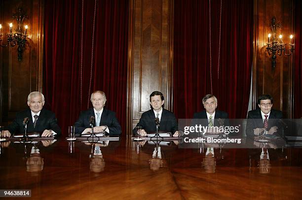 Members of Chile's central bank board, Enrique Marshall, left to right, general manager, Jorge Desormeaux Jimenez, vice president, Jose de Gregorio,...