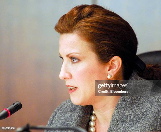 Kathleen Casey, a member of the Securities and Exchange Commission, speaks during a December 13 hearing in Washington, D.C., in which the commission...