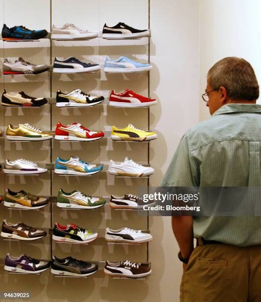 A Puma brand sneaker on display in a shoe store in New York on