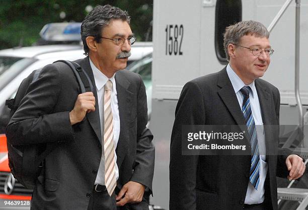 Eric Honegger, left, former Swissair Chairman, arrives with his lawyer at the Swissair trial in Buelach, Switzerland, Thursday, June 7, 2007....