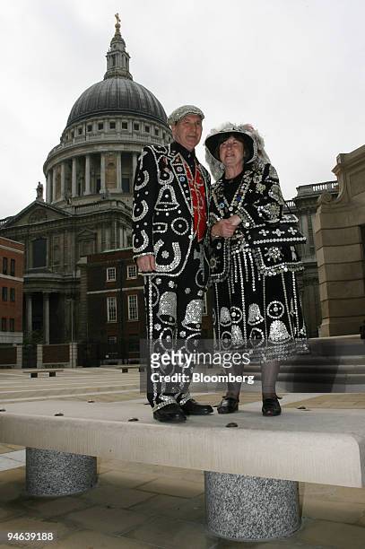 The Pearly King and Queen of Crystal Palace, Pat and Carole Jolly pose outside of St. Paul's Cathedral during a promotion for the Museum of London,...