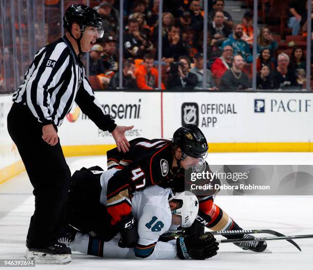 Hampus Lindholm of the Anaheim Ducks battles against Eric Fehr of the San Jose Sharks in Game Two of the Western Conference First Round during the...