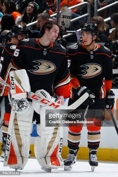 John Gibson of the Anaheim Ducks chats with Brandon Montour in Game Two of the Western Conference First Round against the San Jose Sharks during the...
