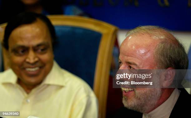 Murali Deora, Indian petroleum minister, left, and M. H. Nejad Hosseinian, Iranian deputy oil minister, right, speak to the media at a news...