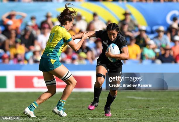 Sarah Goss of New Zealand takes on the defence of Alicia Quirk of Australia during Rugby Sevens on day 11 of the Gold Coast 2018 Commonwealth Games...