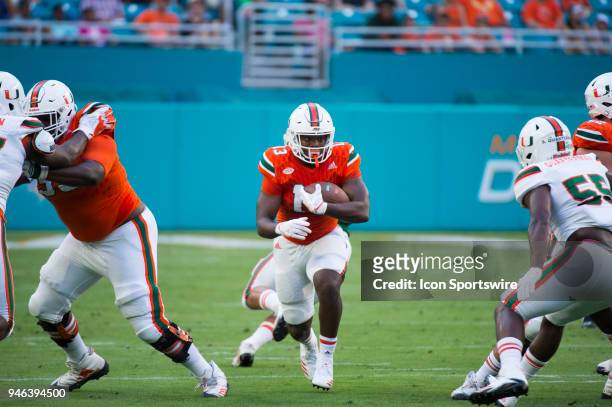 University of Miami Hurricanes DeeJay Dallas runs with the ball during the University of Miami Hurricanes Spring Game on April 14, 2018 at the Hard...