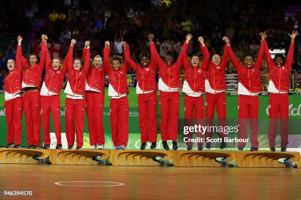 Gold medalists England pose during the medal ceremony for the Netball Gold Medal Match on day 11 of the Gold Coast 2018 Commonwealth Games at Coomera...