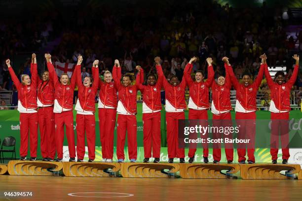 Gold medalists England pose during the medal ceremony for the Netball Gold Medal Match on day 11 of the Gold Coast 2018 Commonwealth Games at Coomera...