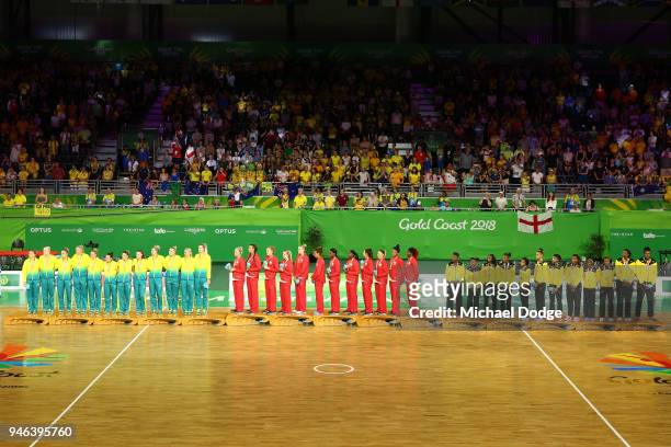 Silver medalists Australia, gold medalists England and bronze medalists Jamaica pose during the medal ceremony for the Netball Gold Medal Match on...