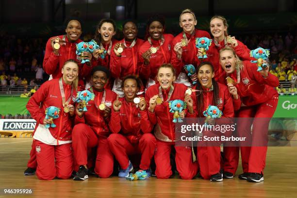 Gold medalists England pose during the medal ceremony for the Netball Gold Medal Match on day 11 of the Gold Coast 2018 Commonwealth Games at Coomera...