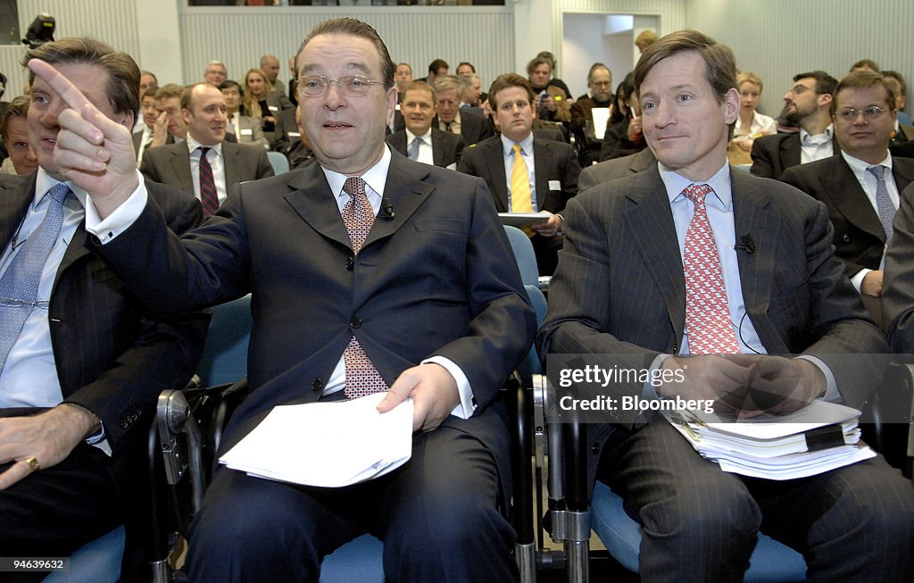 Credit Suisse Chief Executive Oswald J. Gruebel, left, and i