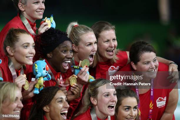 Gold medalists England pose during the medal ceremony for the Netball Gold Medal Match on day 11 of the Gold Coast 2018 Commonwealth Games at Coomera...