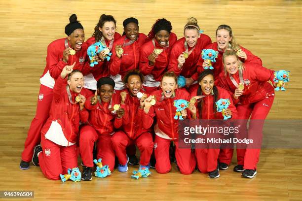 Gold medalists England pose during the medal ceremony for the Netball Gold Medal Match on day 11 of the Gold Coast 2018 Commonwealth Games at Coomera...