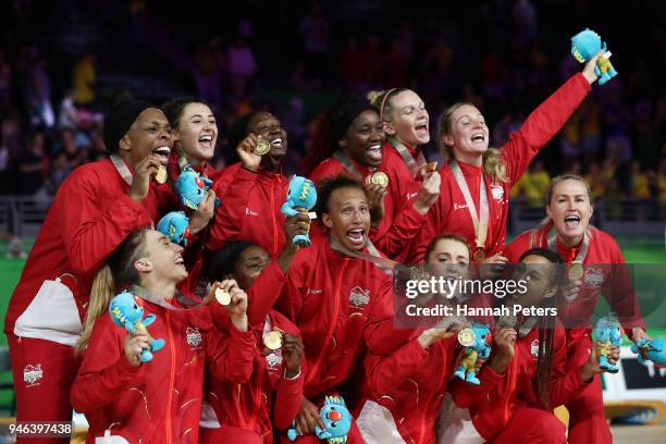 Gold medalists England pose during the medal ceremony for the Netball Gold Medal Match on day 11 of the Gold Coast 2018 Commonwealth Games at Coomera...