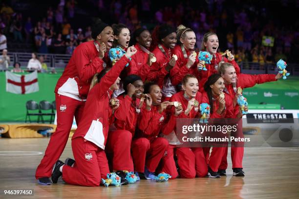 Gold medalists England pose during the medal ceremony for the Netball Gold Medal Match on day 11 of the Gold Coast 2018 Commonwealth Games at Coomera...