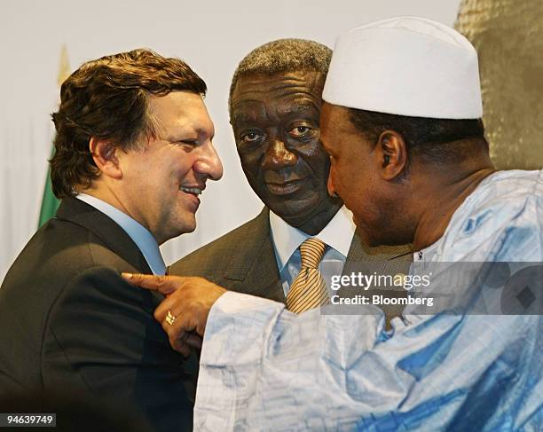 Jose Manuel Barroso, president of the European Commission, left, John Kufuor, president of Ghana, center, and Alpha Oumar Konare, chairman of the...