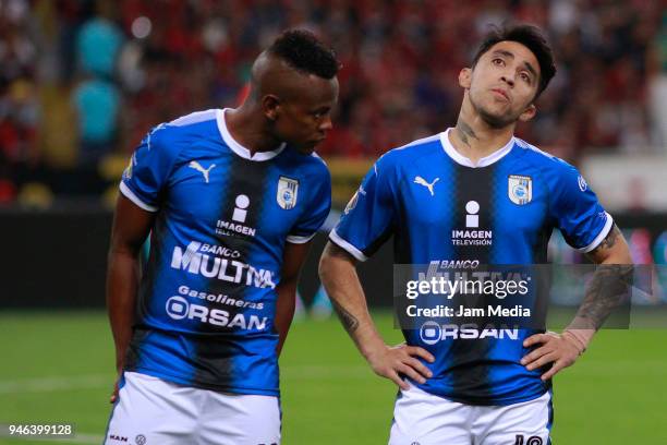 Yerson Candelo and Edson Puch of Queretaro gesture during the 15th round match between Atlas and Queretaro at Estadio Jalisco on April 13, 2018 in...