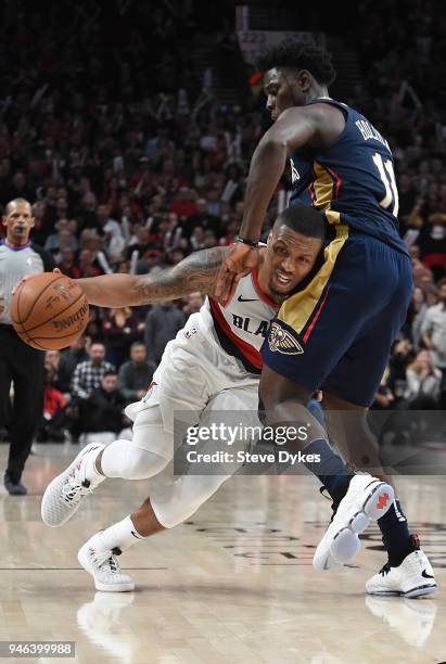 Damian Lillard of the Portland Trail Blazers tries to get past Jrue Holiday of the New Orleans Pelicans during the second half of game one of the the...