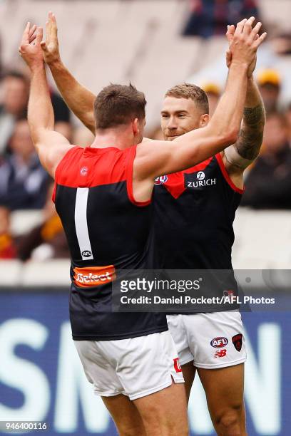 Dean Kent of the Demons celebrates a goal with Jesse Hogan of the Demons during the round four AFL match between the Hawthorn Hawks and the Melbourne...