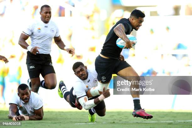 New Zealand Regan Ware scores a try in the Men's Gold Medal Rugby Sevens Match between Fiji and New Zealand on day 11 of the Gold Coast 2018...