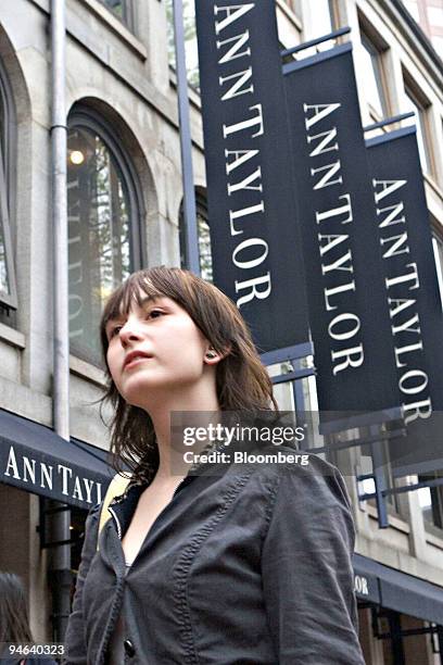 Woman walks past an Ann Taylor store in Boston, Massachusetts, Friday, May 19, 2006. AnnTaylor Stores Corp., the women's clothing retailer, said...