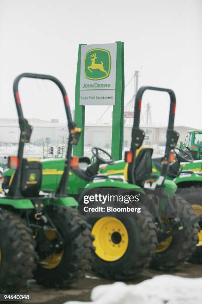 John Deere tractors sit on the lot of a dealership in Longmont, Colorado, on Wednesday, Feb. 14, 2007. Deere & Co., the world's largest maker of farm...