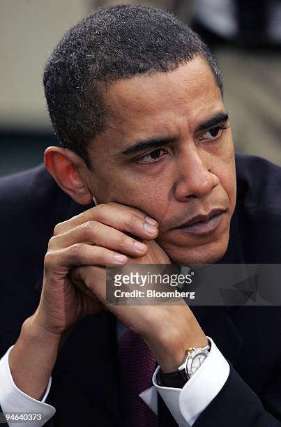 Senator Barack Obama listens to workers of two Illinois nuclear plants that say they were affected by nuclear waste, prior to testifying in front of...
